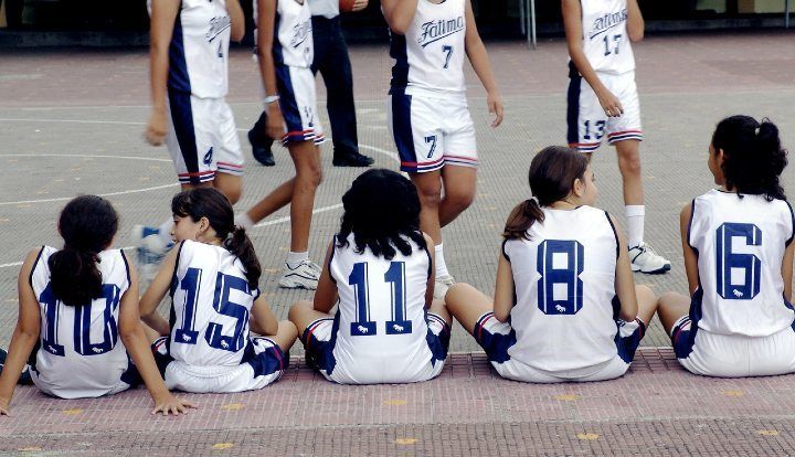 young girls waiting to play basketball