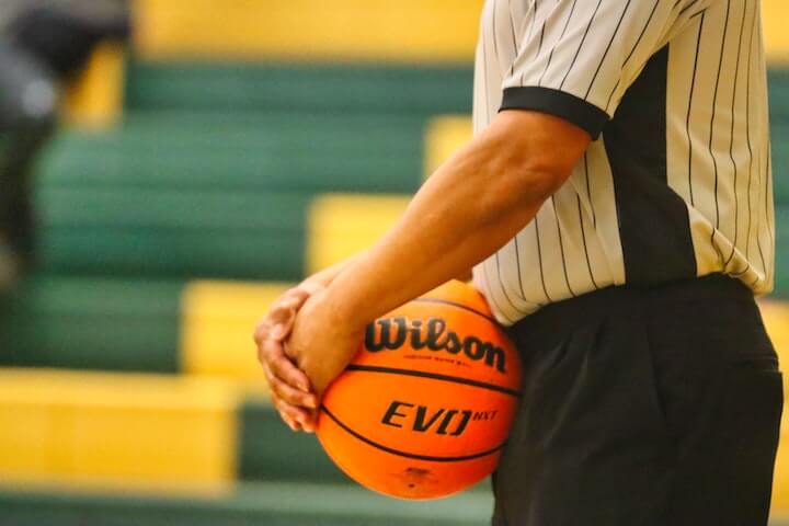referee-holds-the-basketball-during-a-game